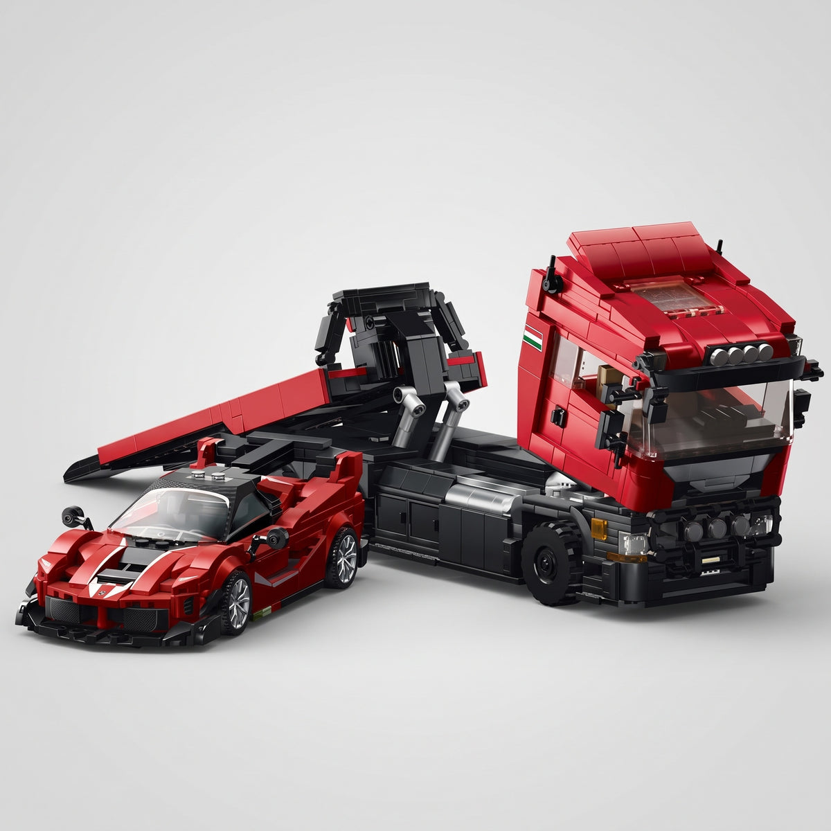Maquette camion 1/24 Trailer Set : dépanneuse plateau en briques avec sa supercar rouge